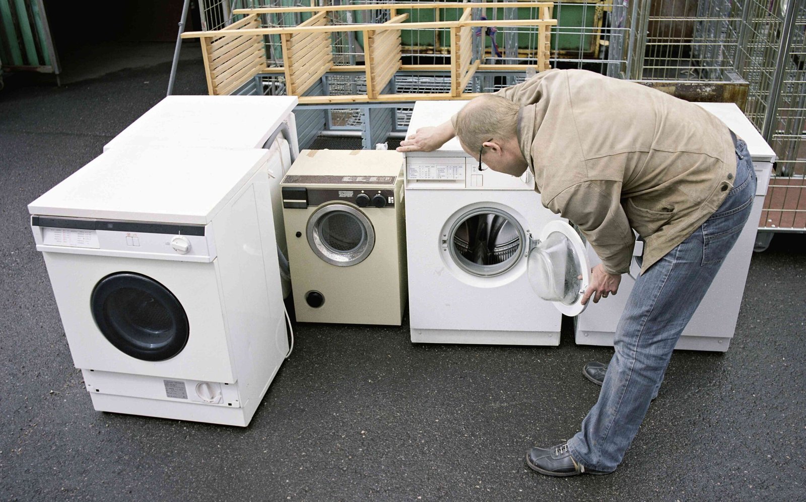 A man looking at the Broken Appliances