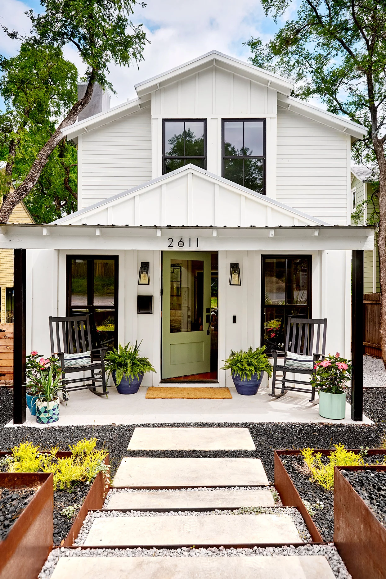 Grounded in Natural Materials home with black trim