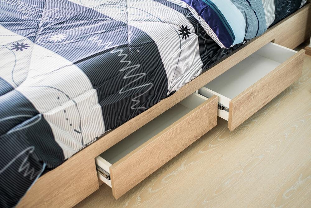 Storage compartment in the bed