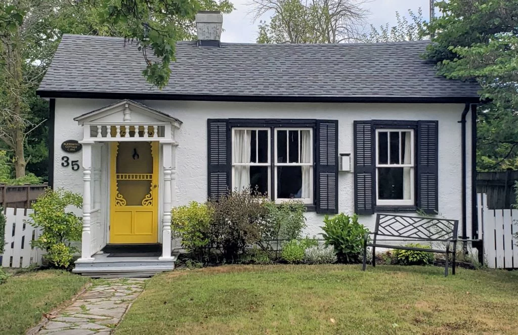 White House Black Trim with Yellow Front Door
