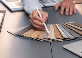 Group of interior designer team in meeting and discussing about tile flooring