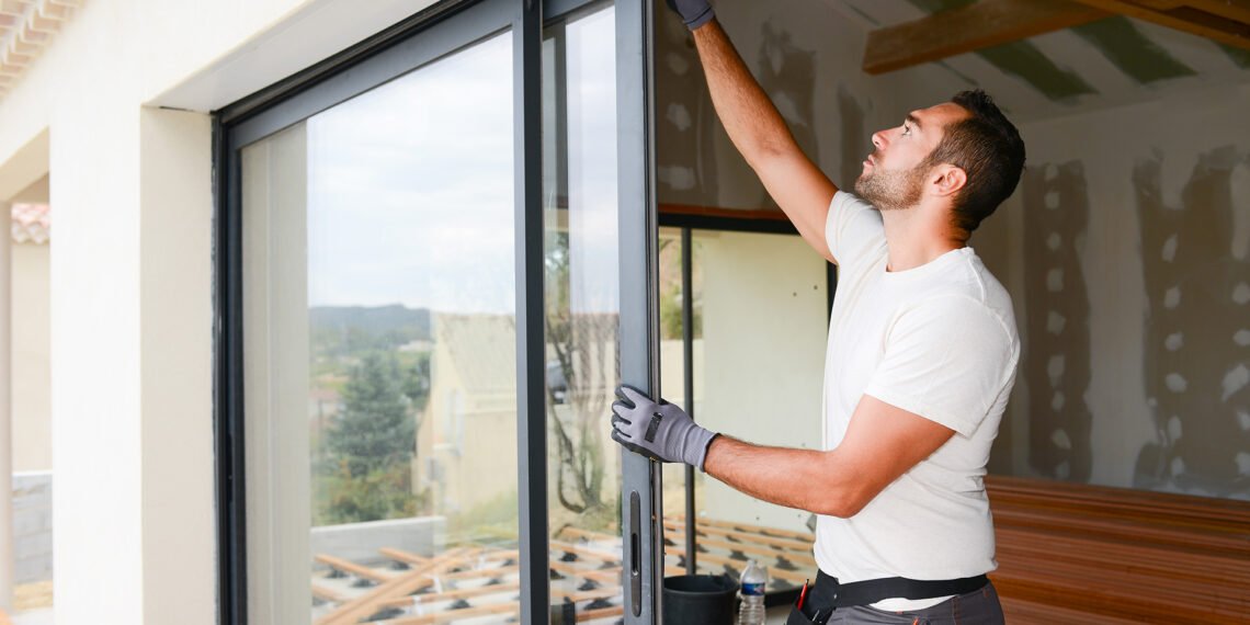 Man cleaning the window- Energy-Efficient Window