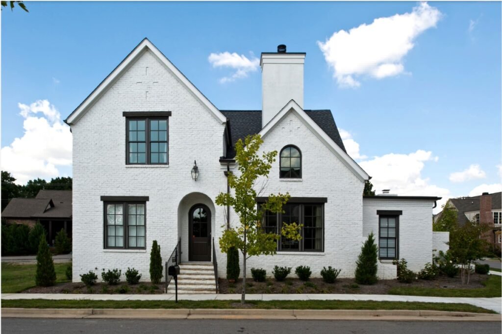 Transitional-style home white windows with black trim