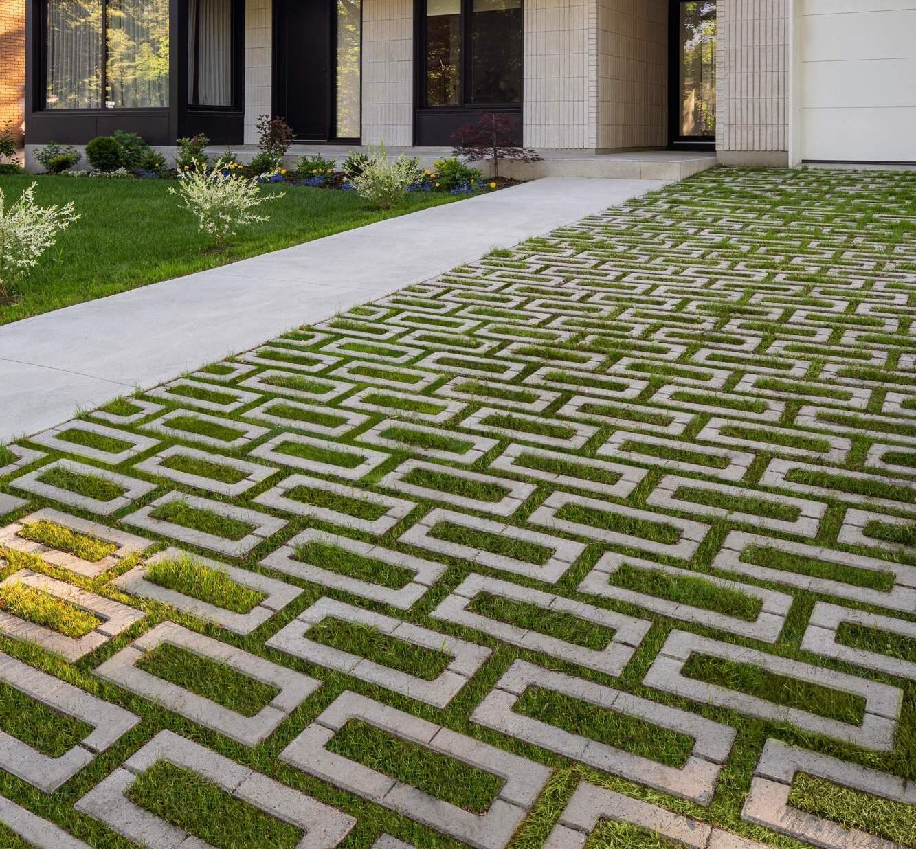Environmentally sustainable concrete and grass driveway