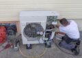 A man repairing Heat Pump