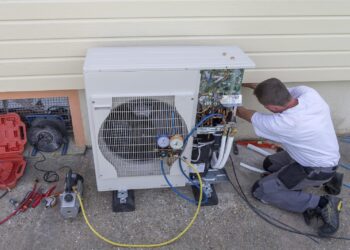 A man repairing Heat Pump