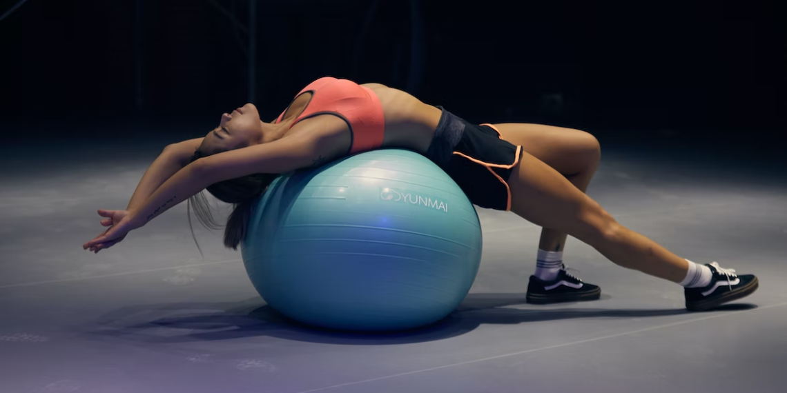 A woman exercising in the gym