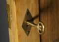 a wooden door with lock and key