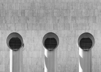 grayscale photo of round metal frame